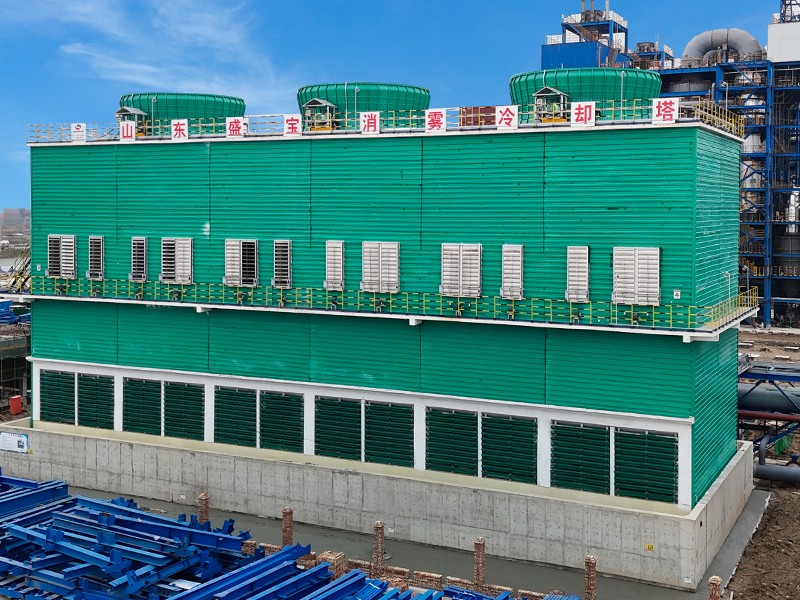 Mist eliminating cooling tower